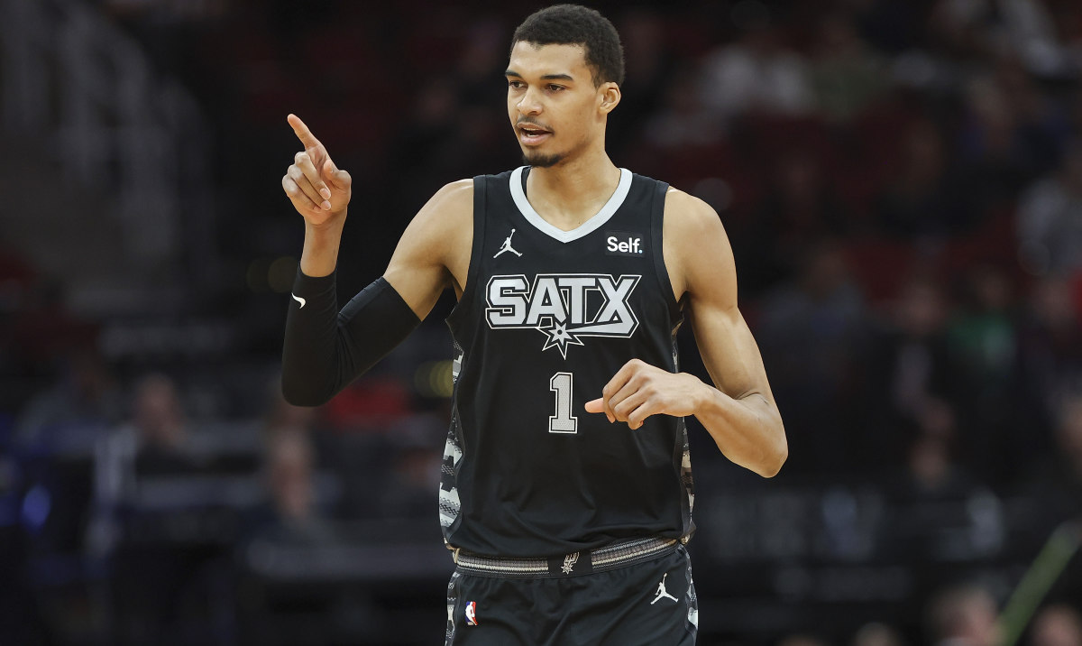 San Antonio Spurs center Victor Wembanyama (1) reacts after a play during the first quarter against the Houston Rockets at Toyota Center.